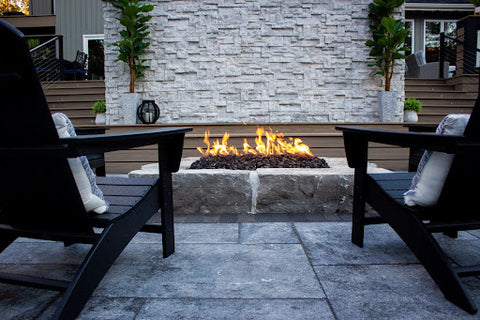 Outdoor living space with fire pit and chairs