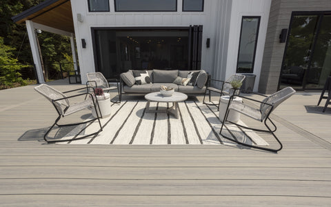Deckorators Voyage Decking in Tundra with white house