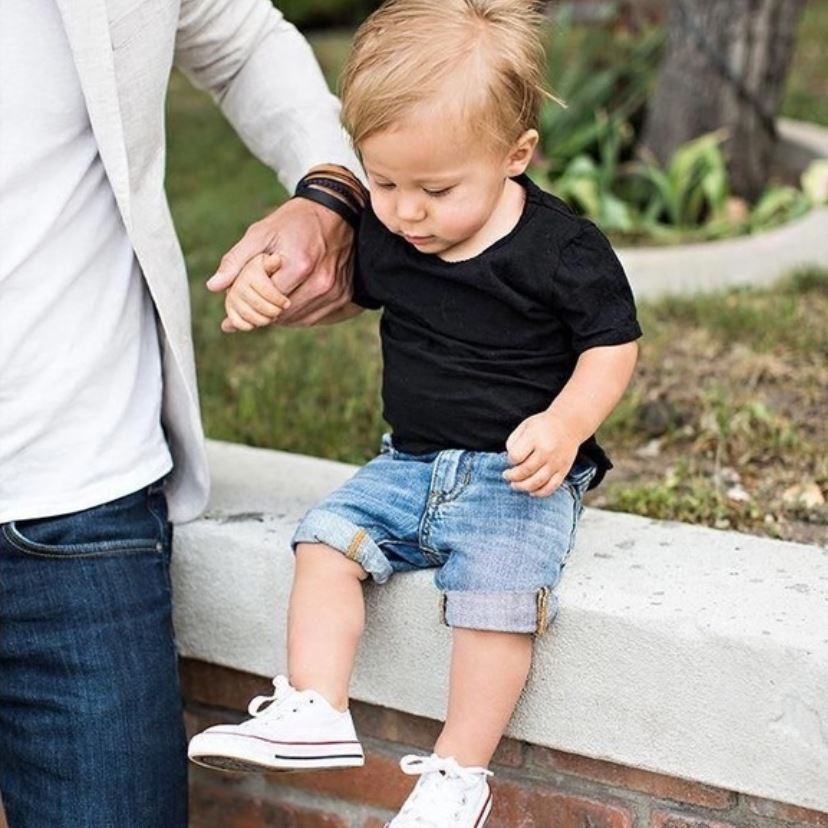 baby wearing converse