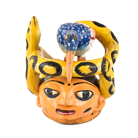 Yoruba Gelede orange mask with yellow snake.