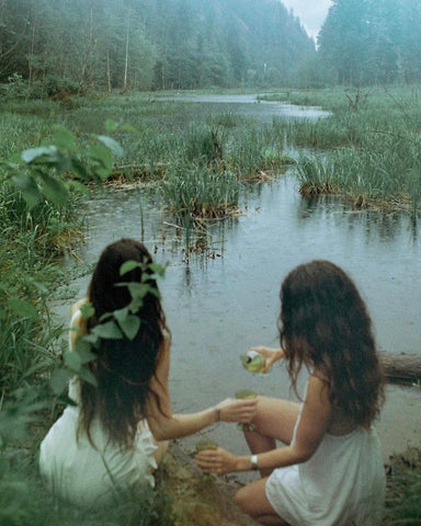 Judianne Grace's beautiful image of two young women enjoying a glass of wine by a misty lake.