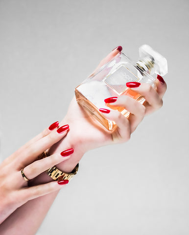 women showing red painted nails