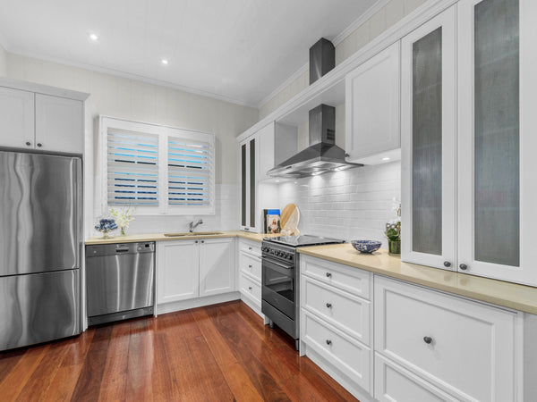 Hamptons style kitchen renovation of worker's cottage in Clayfield