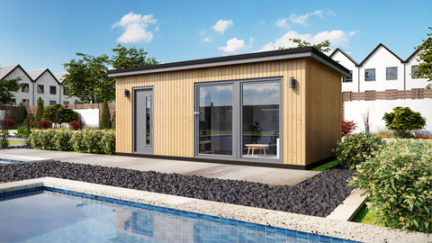 Modern garden annexe with composite cladding, designed as an Annexe Style Bespoke by Rubicon Garden Rooms adjacent to an outdoor swimming pool.