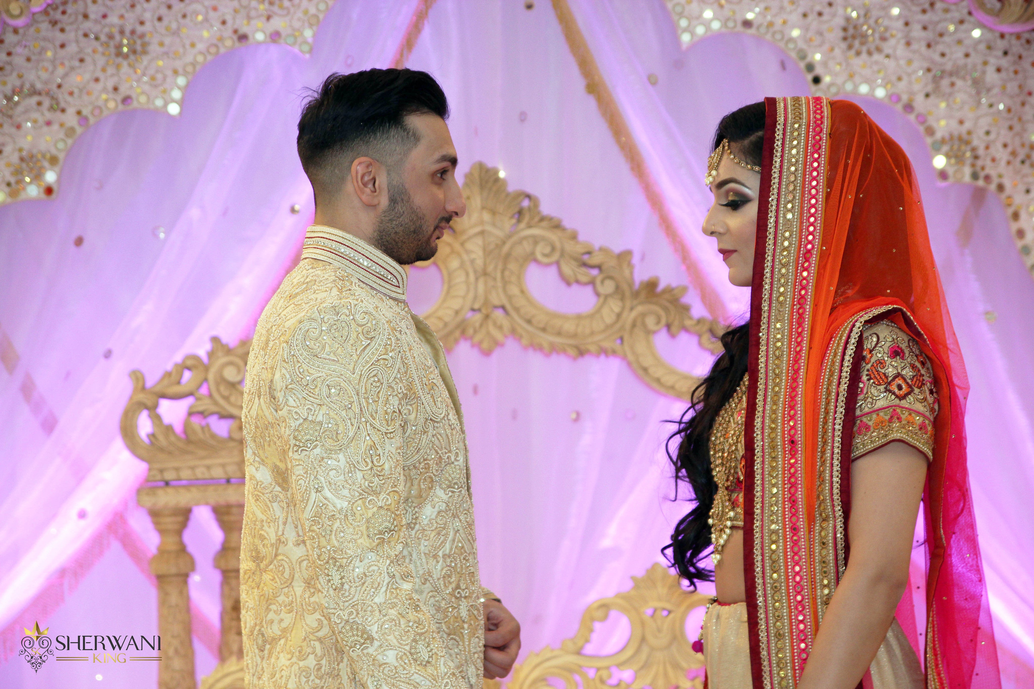 August 2019, Kolkata, India: Indian Groom Dressed in Sherwani with Stunning  Bride Standing with Glamorous Outfit and Jewellery Editorial Photography -  Image of fashion, bride: 157649752