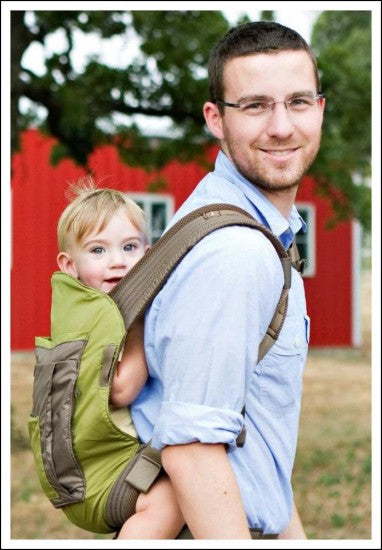 Dr Andrew with his son in an Onya Baby carrier