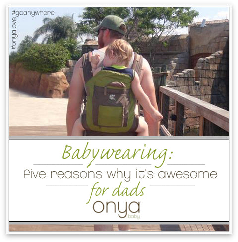 Dad wearing son in back-carry position in an Onya Baby Carrier