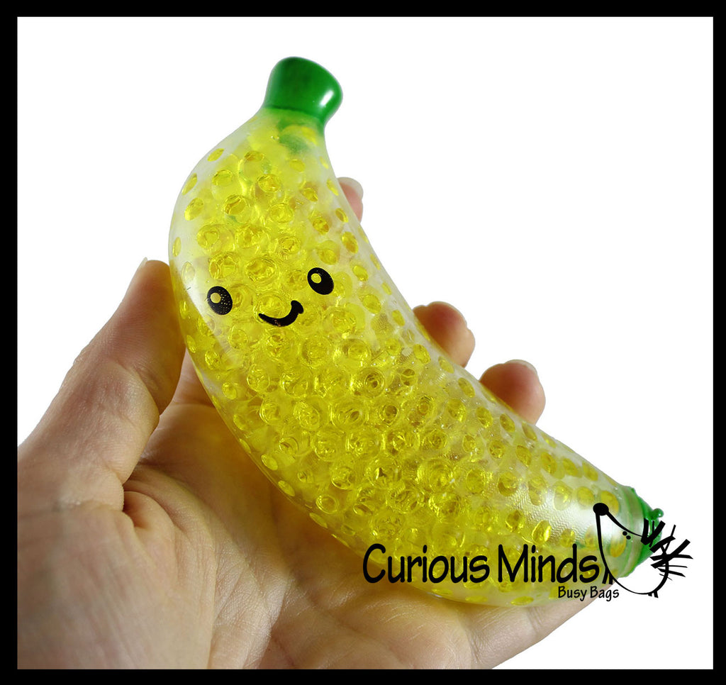 Curious Minds Busy 1 Squishy Sand-Filled Banana Moldable Sensory, Stress, Squeeze Fidget Toy