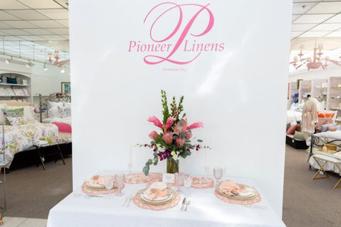 Pioneer Linens Front Wall Image of Logo Sized