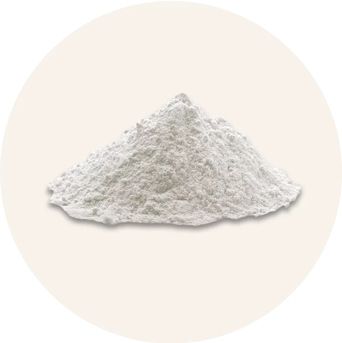 A mound of white, powdered substance on a light background.