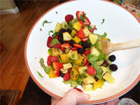 Grilled mango and pineapple with assorted berries and grapes