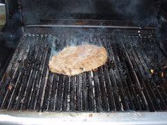 Grill the steak, using high-heat, for about 5 minutes per side. 