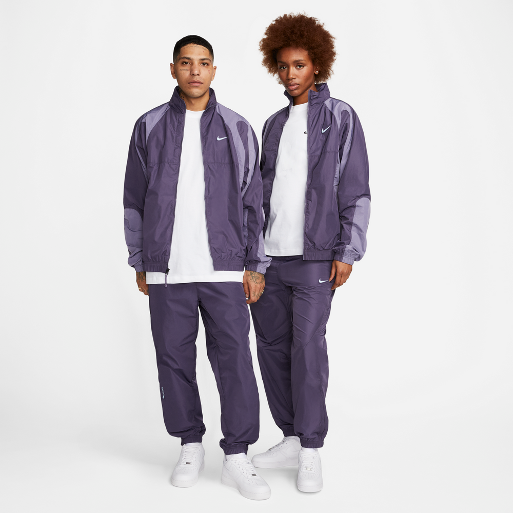 Nike NOCTA Nylon Track Pants In Dark Raisin