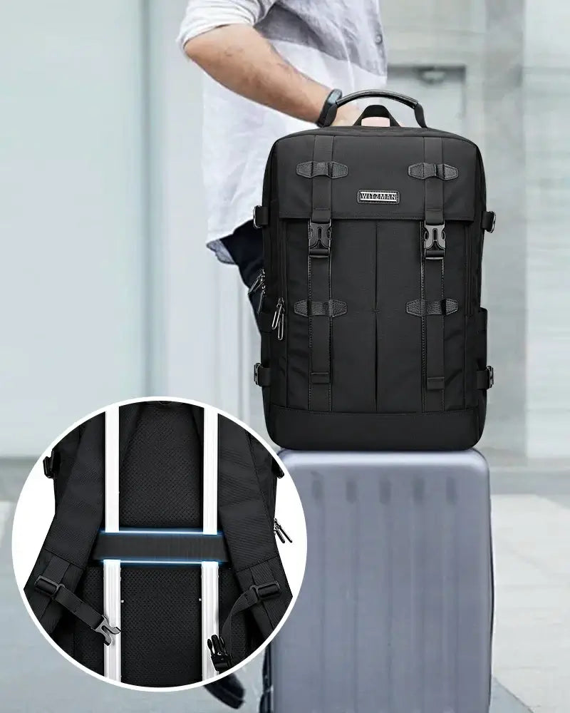 Carry on travel backpack with luggage strap on suitcase handle