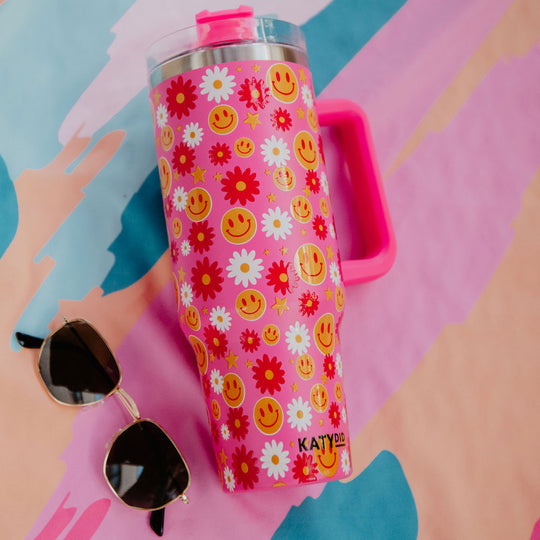 https://cdn.shopify.com/s/files/1/0829/0949/products/stainless-steel-tumbler-smiley-face-hot-pink-floral_540x.jpg?v=1699998921