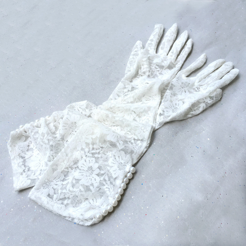 long ivory gloves