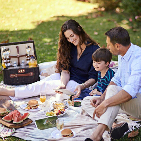 Family of three having a picnic