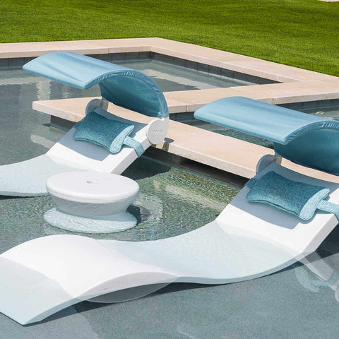 Ledge Signature Chaises with headrest pillows and shades