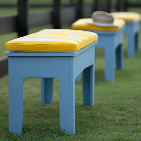 blue outdoor stools with yellow cushions