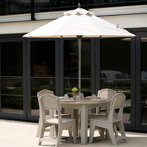 Gray outdoor dining furniture set with umbrella