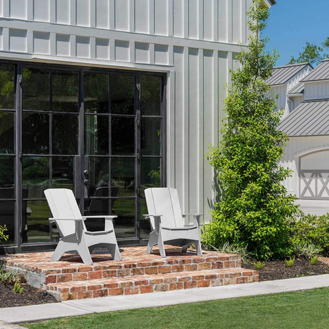 Grey adirondack chairs on the patio