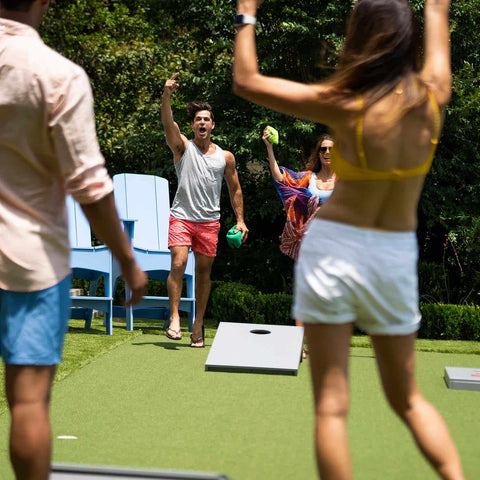 Celebrating during a game of cornhole