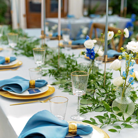 Outdoor dining table decorated for a spring garden party