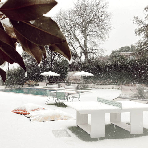 Outdoor space with Ledge in-pool and outdoor products covered in snow