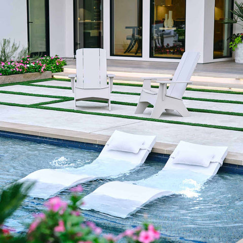 In-pool lounge chairs on the ledge