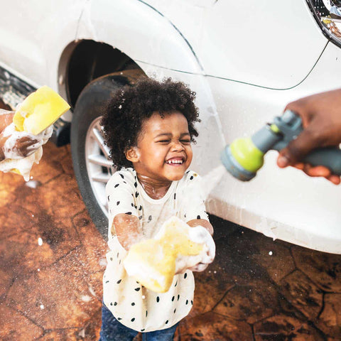 Kids helping wash the car