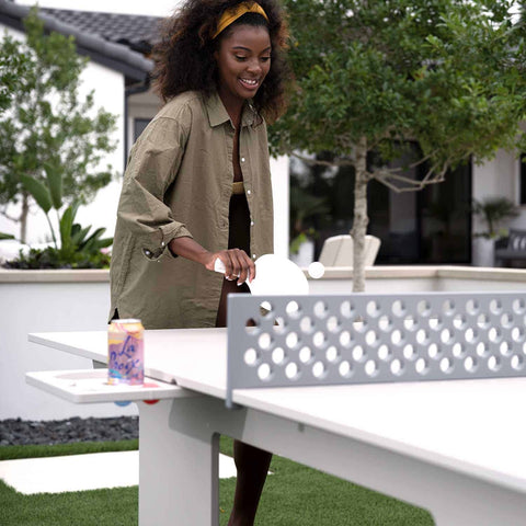 Playing ping pong in the outdoor space