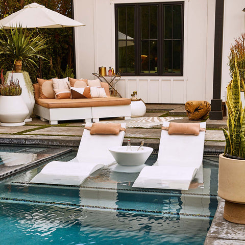 In-Pool Chaise Loungers on the pool ledge with headrest pillows