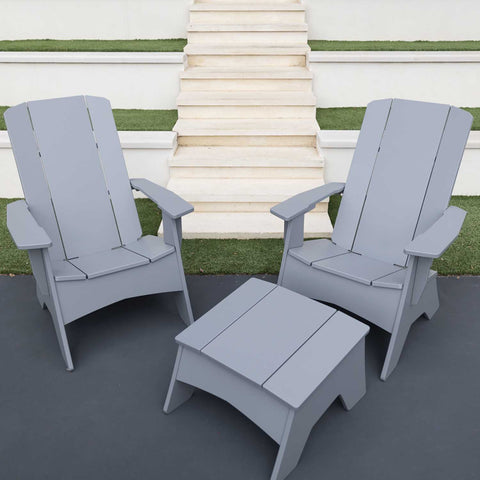 Grey Adirondack chairs outside