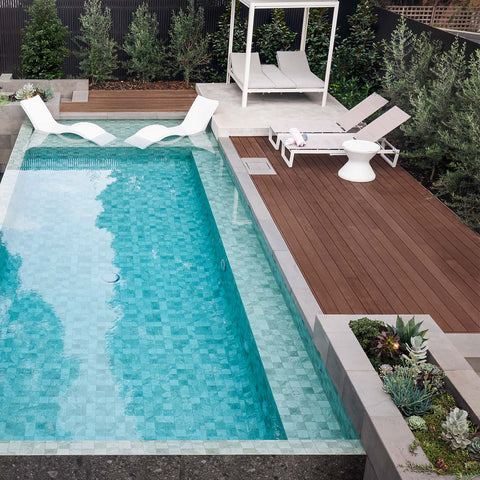 Poolside area with lounge chairs