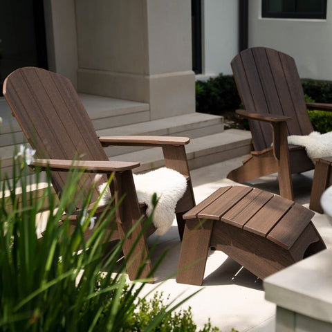 Adirondack chair and ottoman on a patio