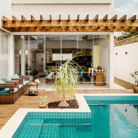 Pool with a tree right next to it