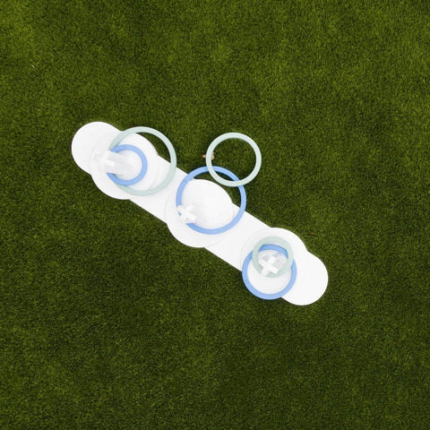 Overhead shot of Ledge Loungers ring toss game on grass