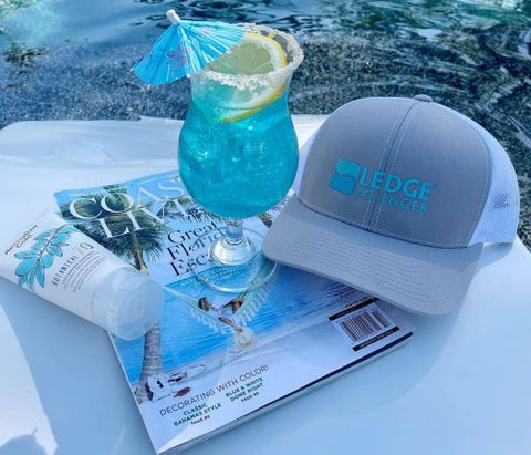 Ledge Lounger merch and Signature Blue drink