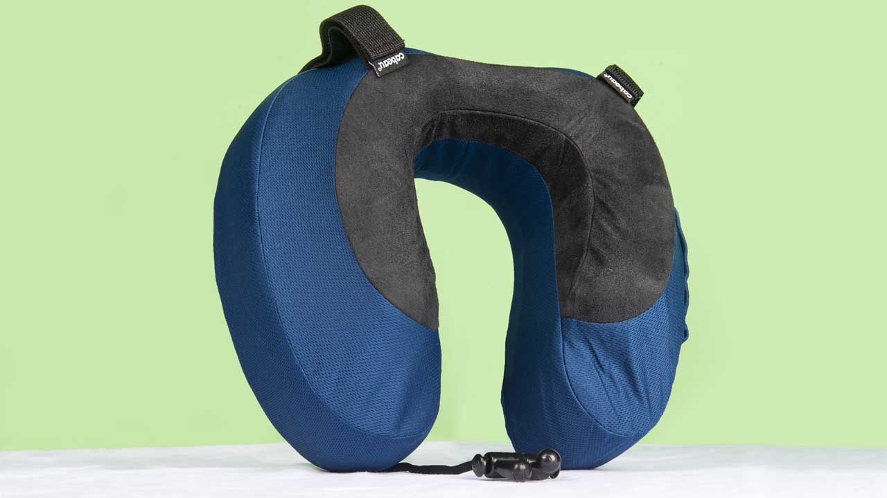 Blue and charcoal gray interior travel pillow