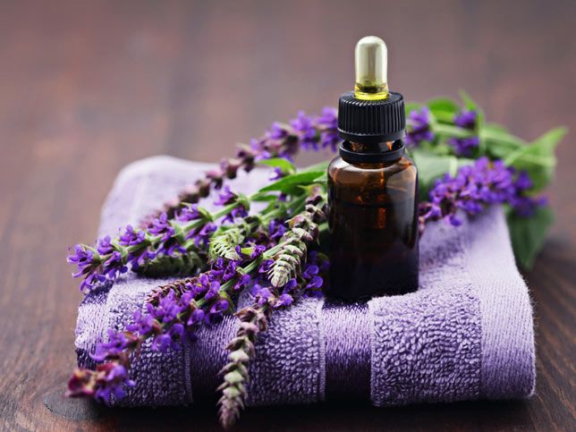 essential oils image of lavender on a purple towel