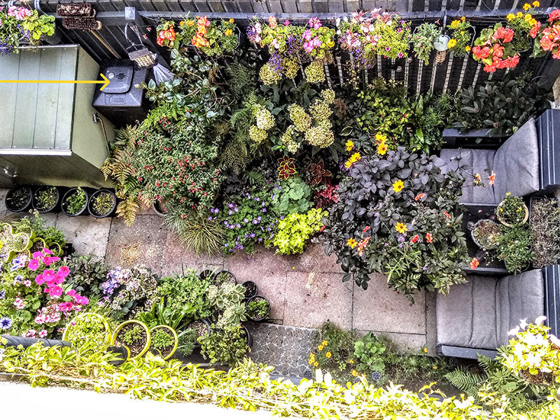 Composting in a small paved container garden