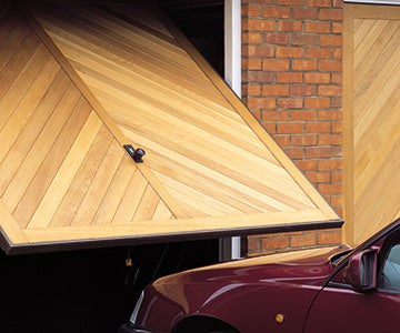 wooden timber garage door with diagonal design