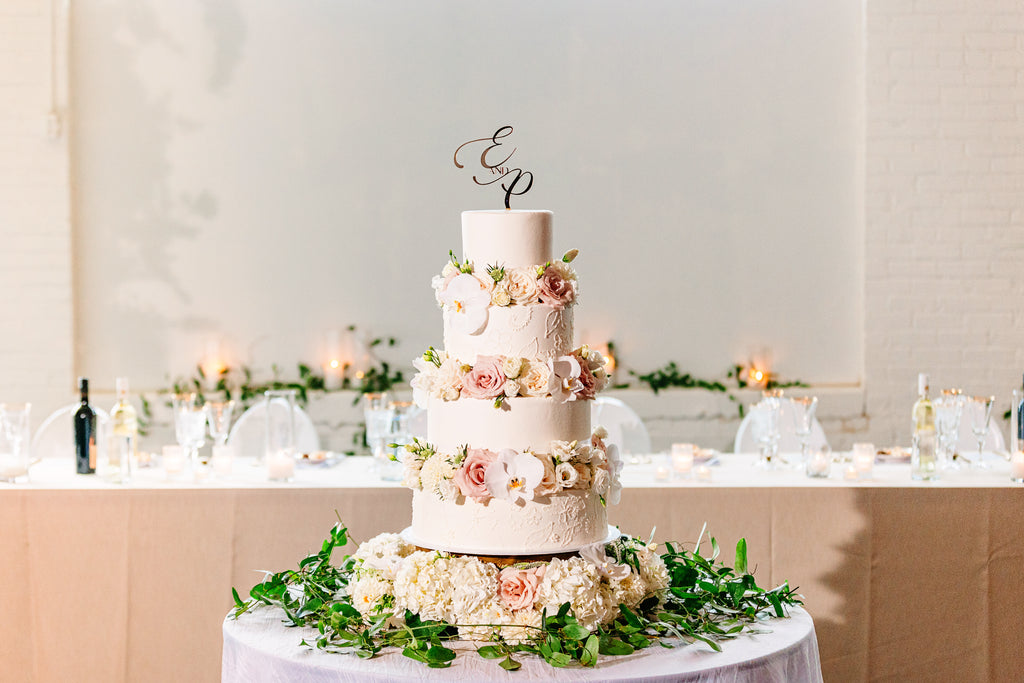 Wedding cake and custom florals and decorations