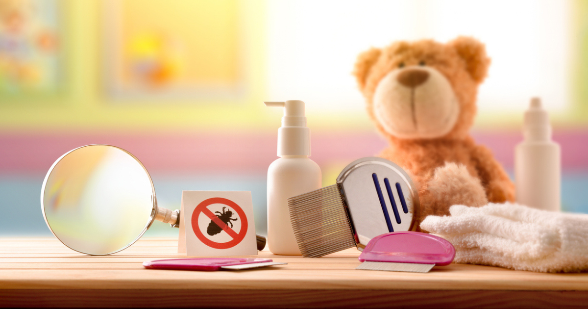 A dresser with a "no lice" sign, nit comb, natural lice treatment shampoo, and other head lice treatment tools.