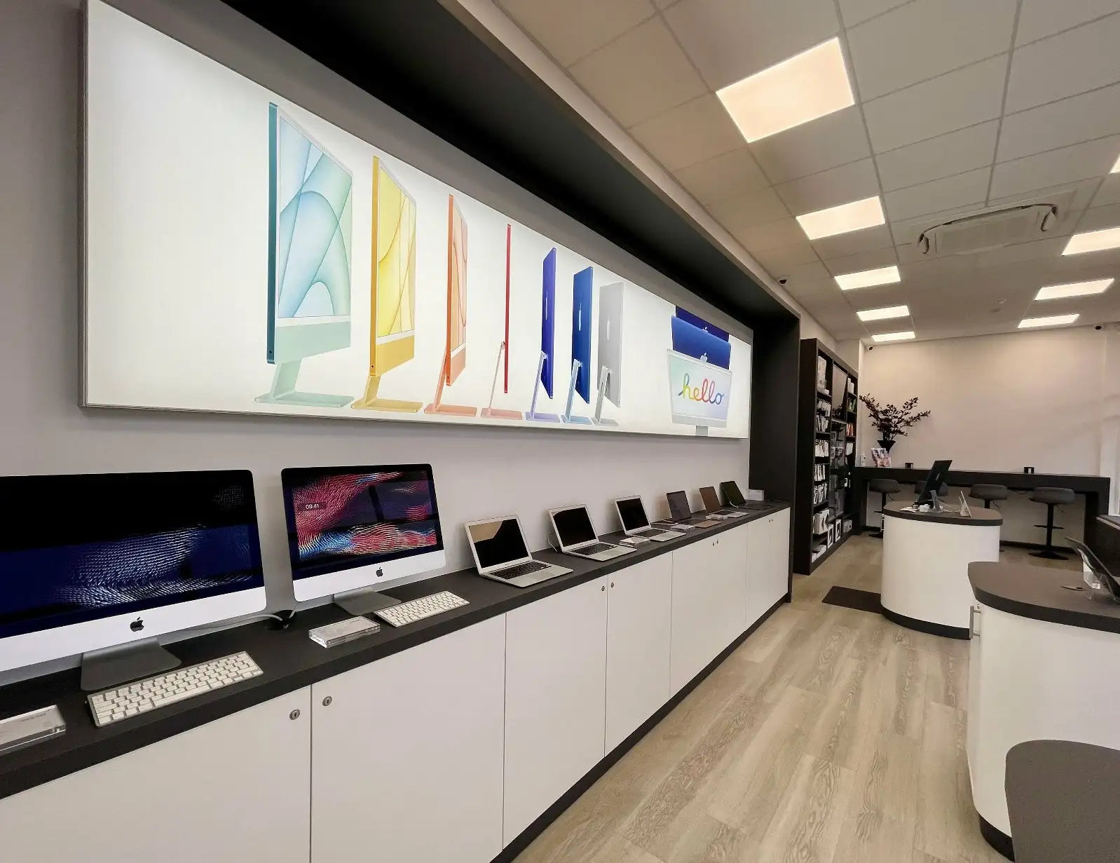 Interior of TekStore showcasing new and refurbished Apple products in Cornwall