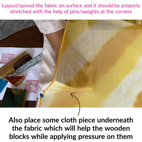 place some cloth piece underneath the fabric which will help the wooden blocks while applying pressure on them.