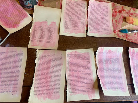 old book pages torn out and painting pink for Valentine's Day card making