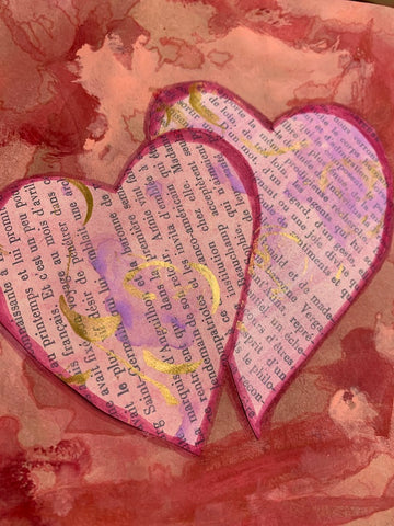 homemade Valentine's Day card made from brown paper bag, old book pages, markers, paints