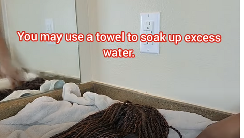 Absorb the water with a towel