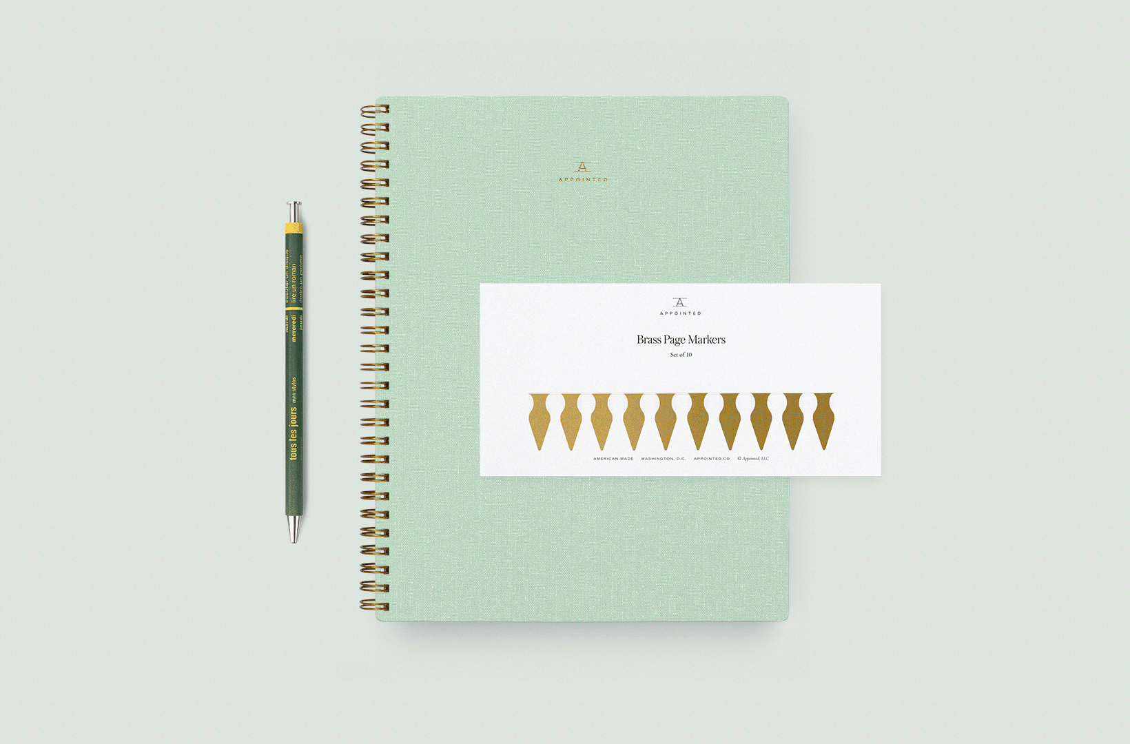 A rotating gif shows the new Mineral Green Notebook paired with items from the Build Your Own Set collection